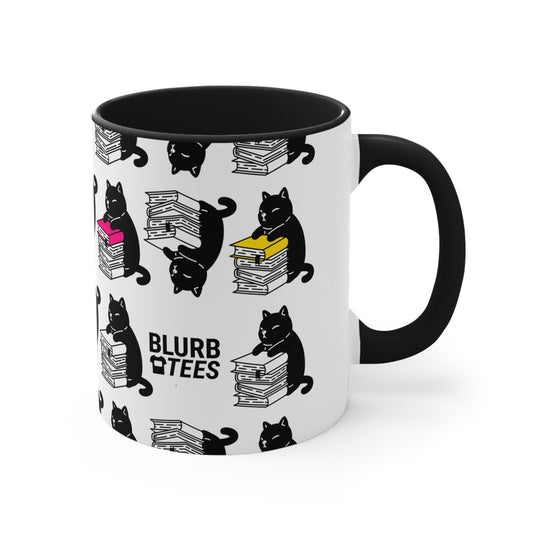 This adorable Blurb Tees Mug features a clever cat reading a book, showcasing a love for literature and feline charm. Made with vibrant colors and charming design, it's the perfect gift for book lovers and cat enthusiasts alike.