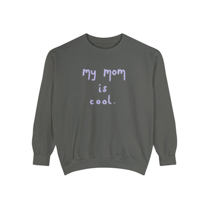 Celebrate Mother's Day with a touch of humor in our Funny "My Mom Is Cool" Sweatshirt. Made from high-quality materials, this sweatshirt is both comfortable and stylish. Show your mom how much you appreciate her in a fun and unique way. Perfect for any mom who's cool in your eyes.